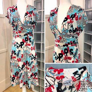 Pop Art Fashion Pin-Up Dress with V neckline and ruched waist!